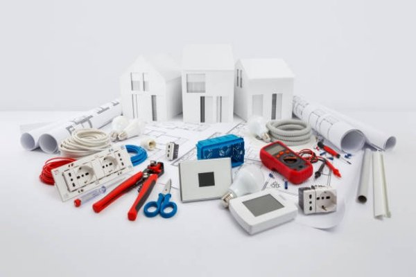 electrical controls for house planning, equipment and electrician work tools on blueprint with model house, electric store, technical assistance, supply and installation, electrical systems concept